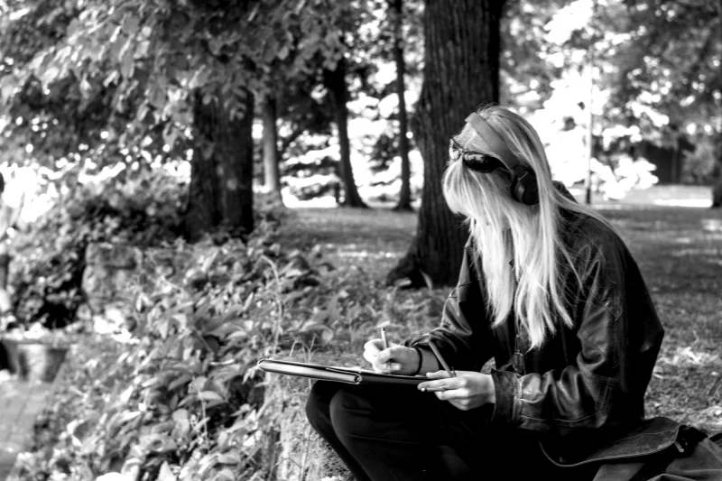 Girl drawing at the park