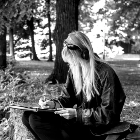 Girl drawing at the park