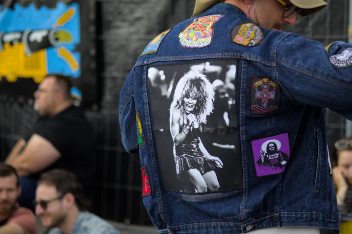 Back of a denim battle jacket covered in band patches around a black-and-white Tina Turner photo, Binic Folk Blues Festival 2024